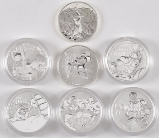 SEVEN BRITISH COMMONWEALTH SILVER DOLLARS