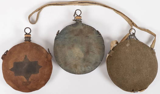 5 CIVIL WAR & INDIAN WARS CANTEENS: 5 CIVIL WAR & INDIAN WARS CANTEENS. Comprising 5 individual U.S. canteens including a CW converted to Indian Wars canteen, the cloth cover painted with corps badge. Also a M1878 example with a blue cl