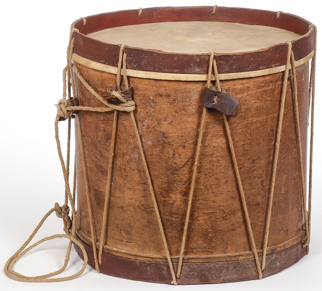 A U.S. CIVIL WAR SNARE DRUM: A U.S. CIVIL WAR SNARE DRUM. Of traditional design and manufacture, together with two ebonized wood drumsticks. Height 16 inches, diameter 16 inches.