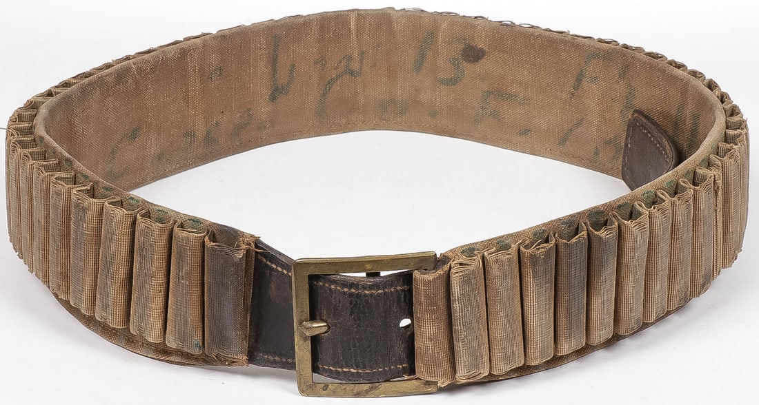 RARE ID'D INDIAN WARS M1876 CARTRIDGE BELT: RARE ID'D INDIAN WARS M1876 CARTRIDGE BELT. Comprising a good model 1876 3rd pattern long tongue cartridge belt named on verso to Fred Chase Co. F. 15th INF, Ft. Union, N.M., overall length including 