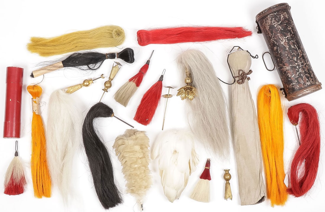 BRITISH & AMERICAN HORSEHAIR & FEATHER PLUMES: BRITISH & AMERICAN HORSEHAIR & FEATHER PLUMES, C.1900. Comprising 14 horsehair plumes in red, yellow, black and white, two with original paper labels one dated 1898 another 1902 with U.S. makers names