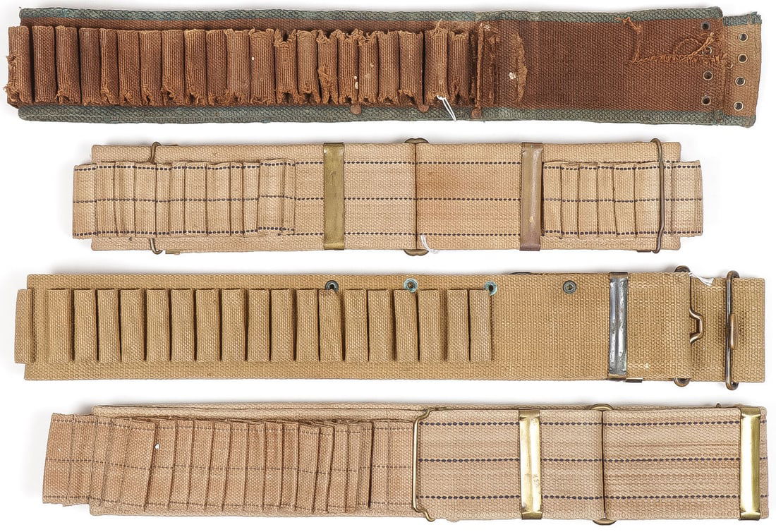 4 U.S. CARTRIDGE BELTS C. 1880-1900: 4 U.S. CARTRIDGE BELTS C. 1880-1900. Comprising a Mills cotton web 40 round cartridge belt likely never issued, length 40 inches. Another cotton web belt with three horizontal blue lines, stenciled on