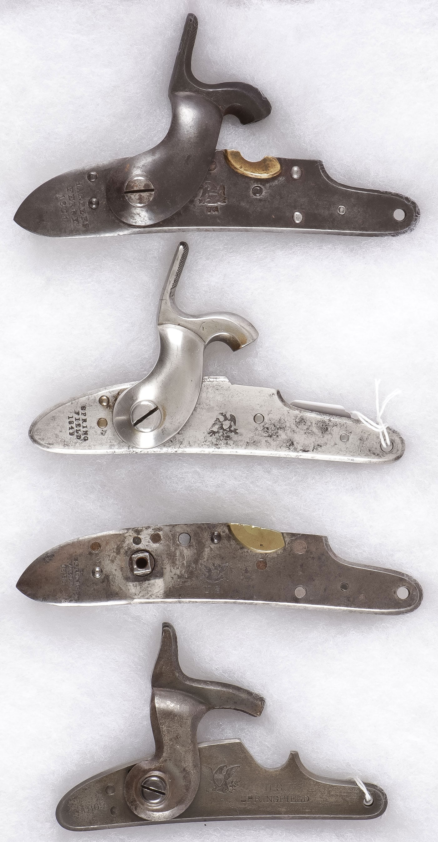 HARPERS FERRY & SPRINGFIELD LOCK PLATES: HARPERS FERRY & SPRINGFIELD LOCK PLATES. Comprising an 1831 dated Harpers Ferry percussion conversion lock plate with hammer stamped with Eagle over US. As well as an 1836 dated Springfield percussion