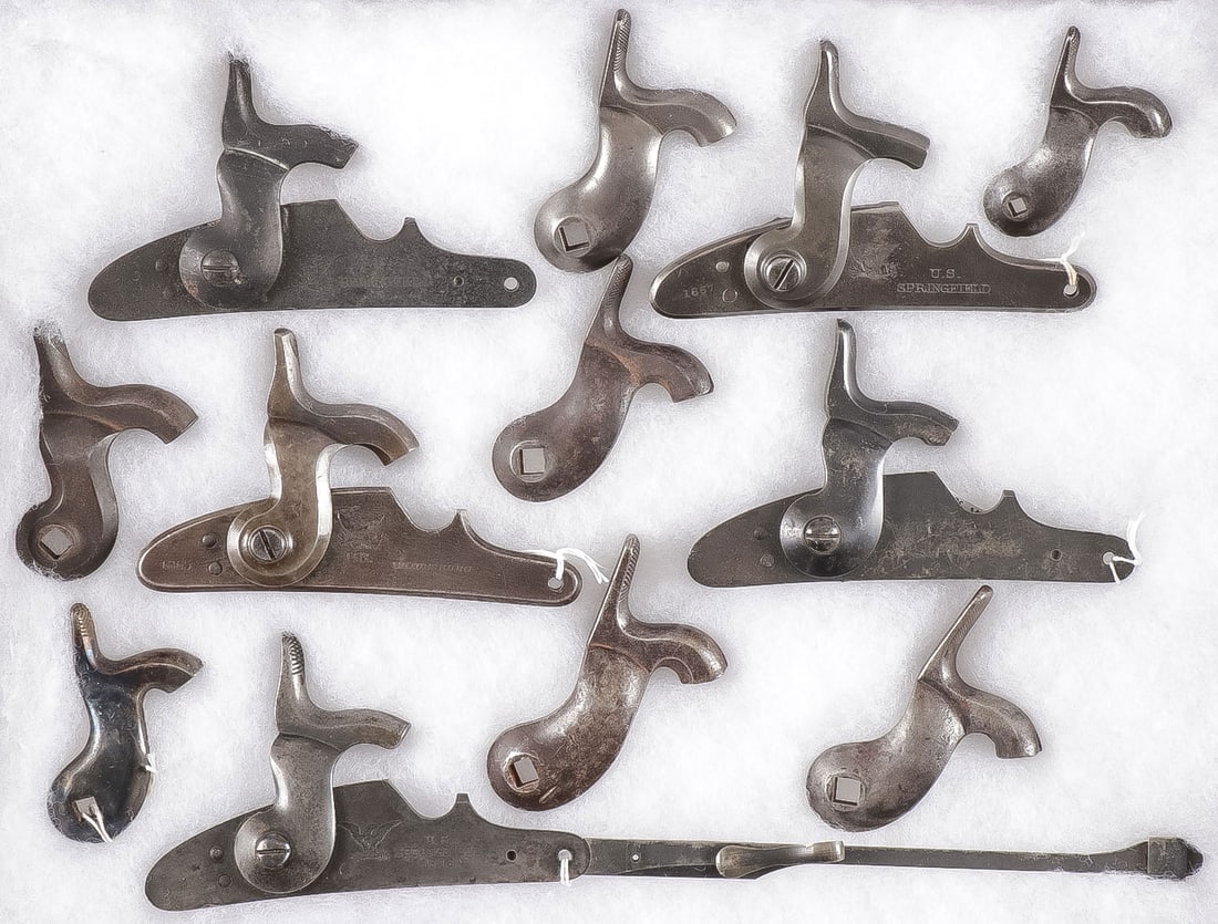 SPRINGFIELD LOCK PLATES, HAMMERS & MORE: SPRINGFIELD LOCK PLATES, HAMMERS & MORE. Comprising 4 Springfield lock plates with hammers, each with U.S. Springfield Eagle marks, various dates 1867, 1873. As well as an 1865 dated Bridesburg lock p