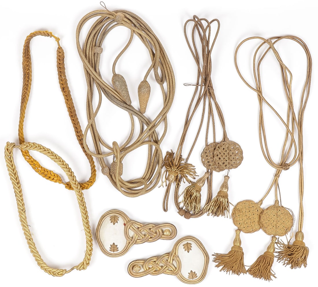 AMERICAN & BRITISH BRAIDED BULLION CORDS & RANK: AMERICAN & BRITISH BRAIDED BULLION CORDS & RANK, C 1880-1900. Comprising a gilt braided Hussar or Lancer hat cord with pinecone terminals, two sets of gilt braided aiguillettes with tassels, two braid