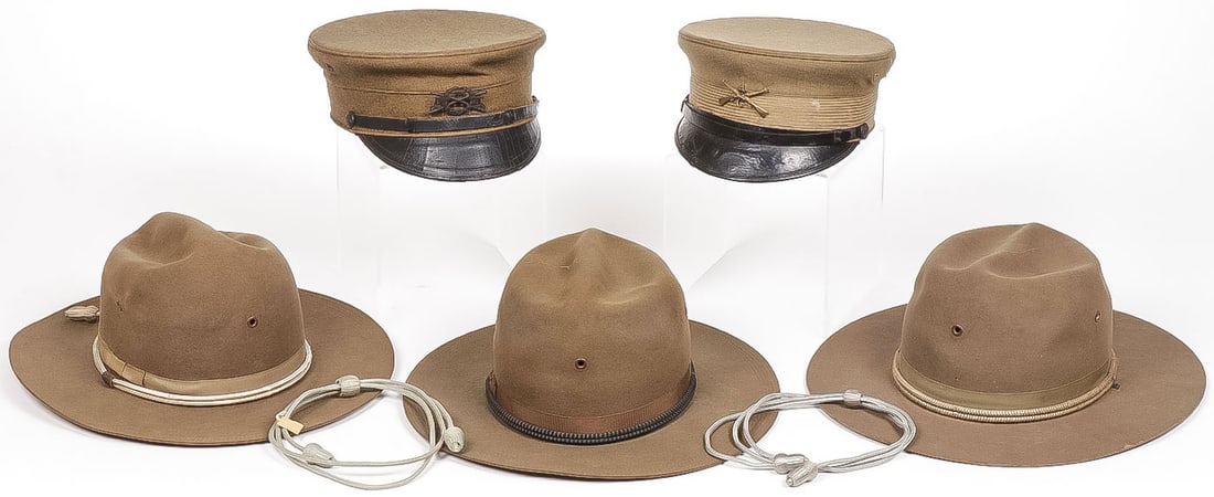 U.S. WWI & EARLIER HATS: U.S. WWI & EARLIER HATS. Comprising 3 WWI ?Smokey Bear' campaign hats, including two with Stetson makers mark, each with identifying hat cord and two additional infantry cords including one with origi