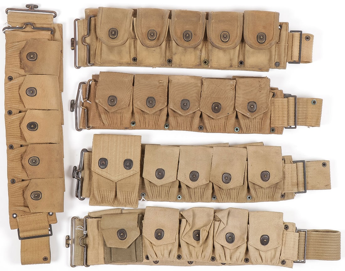 5 GOOD WWI ERA CARTRIDGE BELTS: 5 GOOD WWI ERA CARTRIDGE BELTS. Comprising a 2 Mills M1910 dismounted cartridge belts, a M1912 Mills cartridge belt with .45 acp magazine pouch, a M1914 with both Mills and Russel marked pouches and t