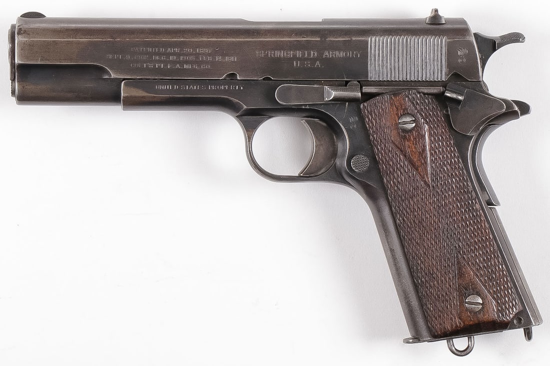 WWI SPRINGFIELD ARMORY 1911 SEMI AUTO PISTOL .45: WWI SPRINGFIELD ARMORY 1911 SEMI AUTO PISTOL .45. WWI Springfield Armory model 1911 semi auto pistol chambered in .45 ACP with S/N 127414 (circa 1915), standard 5" barrel with fixed front blade and u-