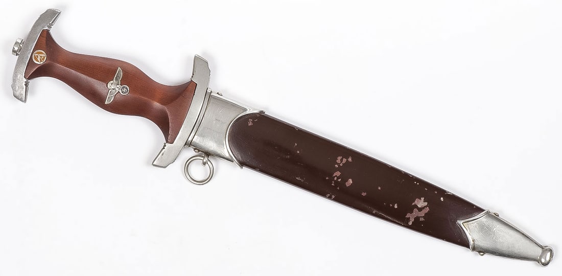 GERMAN WWII SA DAGGER BY EICKHORN: GERMAN WWII SA DAGGER BY EICKHORN. Of standard form with wood grips inlaid with national eagle and SA medallion. Earlier double oval Eickhorn squirrel trademark on ricasso, etched blade "Alles Fur Deu