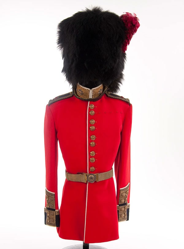 BRITISH LT. COLONEL'S COLDSTREAM GUARDS UNIFORM: BRITISH LT. COLONEL'S COLDSTREAM GUARDS UNIFORM. First half of the 20th century. Group includes Grenadier's cap of black bearskin fur with red feather plume, complete with leather liner and brass chin