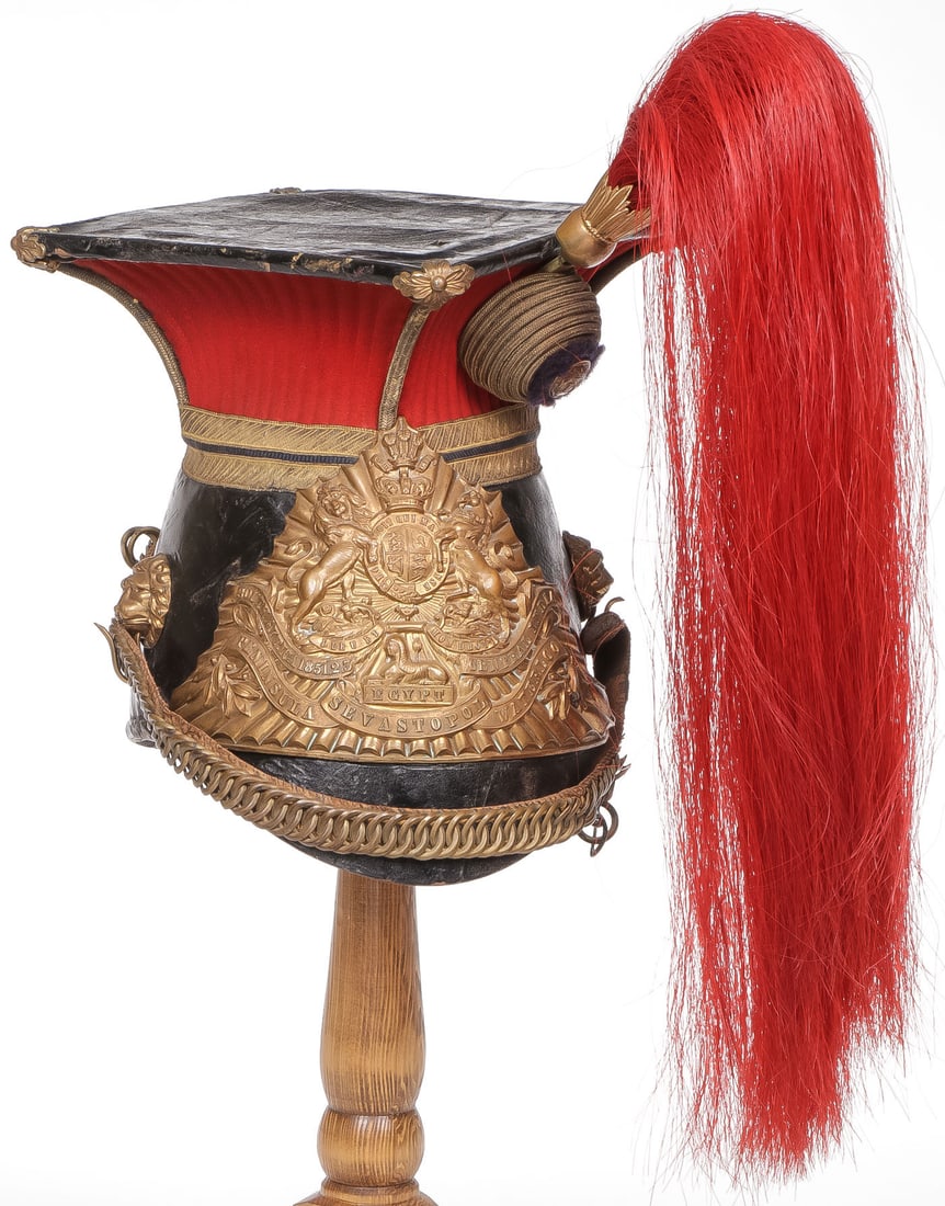 A GOOD 12TH ROYAL LANCERS CHAPKA, 19TH CENTURY: A GOOD 12TH ROYAL LANCERS CHAPKA, 19TH CENTURY. Comprising a good solid chapka, the skull, peak and top of the mortar board are in black patent leather. The corners of the mortar board with gilt brass