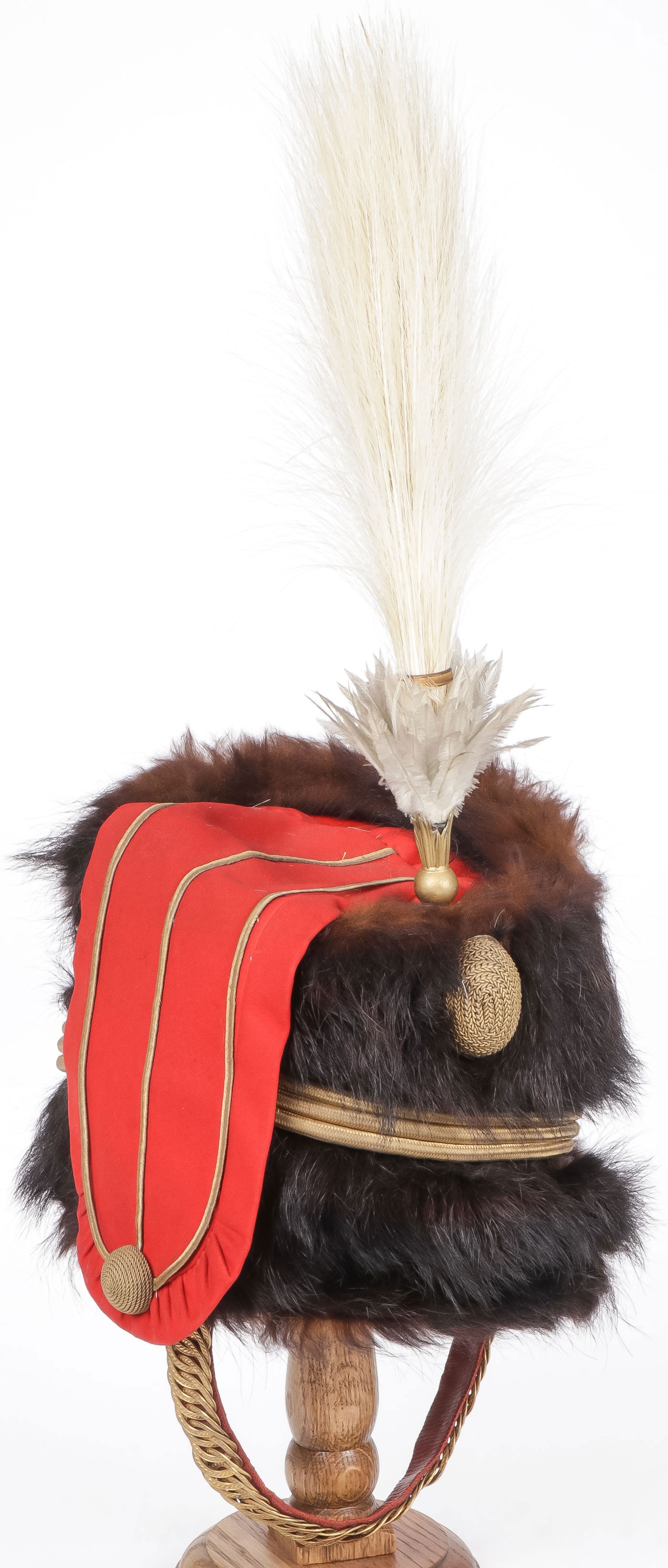 A GOOD BRITISH 7TH HUSSARS FUR BUSBY, C. 1887: A GOOD BRITISH 7TH HUSSARS FUR BUSBY, C. 1887. Comprising a very fine British 7th (Queen's Own) Hussars busby. The bear fur body affixed with bullion cord, red felt gilt piped bag, bullion cockade wit