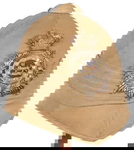 A GOOD BOER WAR IDENTIFIED PITH HELMET C. 1885: A GOOD BOER WAR IDENTIFIED PITH HELMET C. 1885. Comprising a good British Pattern 1877 Colonial Pith Helmet or officially known as the Regulation Foreign Service Helmet. Kakhi covered cork body with k