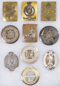 GROUP OF 1O BRITISH PLATES, BROOCHES AND BUCKLES