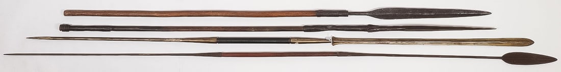 FOUR AFRICAN SPEARS: FOUR AFRICAN SPEARS. Each with forged metal spear tips, some with spikes on opposite end of wooden shaft, possibly Masai, greatest length 84 inches.