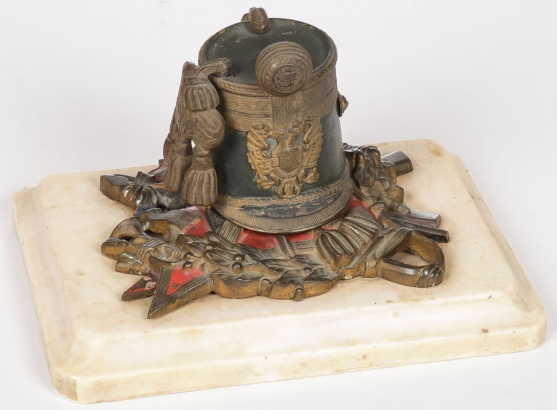 INTERESTING AUSTRO-HUNGARIAN MILITARY INKWELL: INTERESTING AUSTRO-HUNGARIAN MILITARY INKWELL CIRCA 1890. Comprising an attractive and finely sculpted Austro-Hungarian cold painted bronze inkwell. The rectangular polished marble base with beveled e