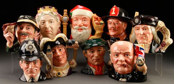 9 ROYAL DOULTON CHARACTER JUGS: NINE ROYAL DOULTON CHARACTER JUGS, LATE 20TH CENTURY. Comprising a "Collector", a "Queen Victoria", a "Santa Claus", a "Fireman", a "Christopher Columbus", a "Bobby", a "Dick Whittington", a "Little M