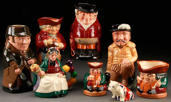 8 PIECE ROYAL DOULTON CHARACTER GROUP: EIGHT PIECE ROYAL DOULTON CHARACTER GROUP, 20TH CENTURY. Comprising a "Sherlock Holmes" seated Toby, a man with ale, a "Huntsman", a "Sir Francis Drake", a "Honest Measure", a balloon seller teapot (c