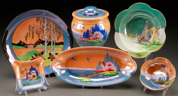 6 NORITAKE ART DECO SCENIC PORCELAIN: A SIX PIECE HAND PAINTED NORITAKE ART DECO SCENIC PORCELAIN GROUP, EARLY 20TH CENTURY. Comprising bowls, cake plate and humidor. All with various scenic or Egyptian designs. Marked with red "M in wrea