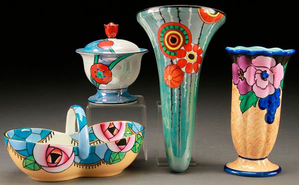 4 PIECES HAND PAINTED NORITAKE ART DECO PORCELAIN: A FOUR PIECE HAND PAINTED NORITAKE ART DECO PORCELAIN GROUP, EARLY 20TH CENTURY. Comprising a wall pocket fluted vase, handled basket, and covered jar. All with stylized floral decoration. Marked with