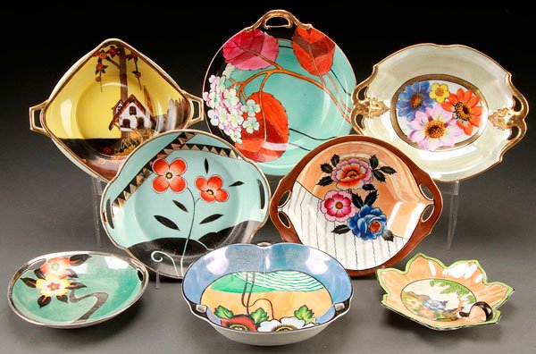 8 HAND PAINTED NORITAKE PORCELAIN NAPPIES: EIGHT HAND PAINTED NORITAKE ART DECO PORCELAIN NAPPIES, EARLY 20TH CENTURY. Each with various floral or scenic decoration. Marked with red and green "M in wreath" back stamps. Largest diameter 8 inche