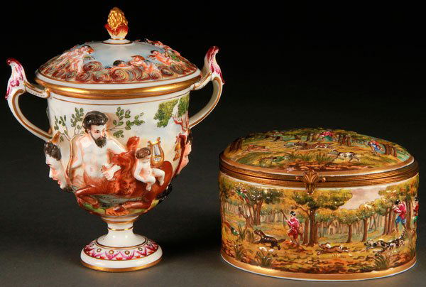 CAPODIMONTE PORCELAIN CUP & DRESSER BOX: A CAPODIMONTE HAND PAINTED PORCELAIN COVERED TWO HANDLED CUP AND LIDDED DRESSER BOX, CIRCA 1900. The cup decorated with a centaur and kentauride and scrolled handles with satyr masked terminals, raise