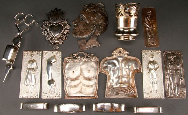 A DECORATIVE STERLING SILVER GROUP: A DECORATIVE STERLING SILVER GROUP, 20TH CENTURY. Comprising a Russian reticulated floral tea glass holder hallmarked Moscow 1898-1914, Ivan Saltykov makers mark, two pairs of sterling napkin rings, t