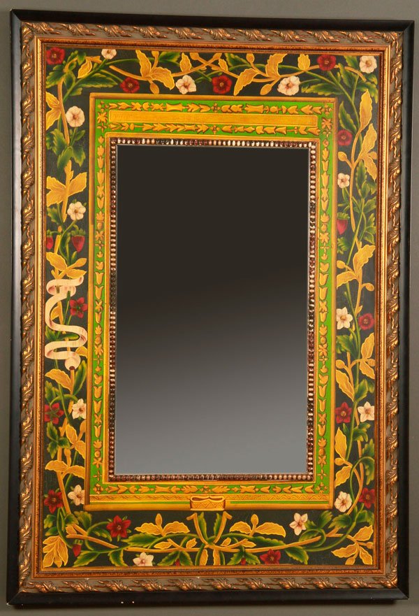 A JOHN RICHARD DESIGNER WALL MIRROR: A JOHN RICHARD DESIGNER WALL MIRROR, LATE 20TH CENTURY. With hand painted polychrome floral surround, height 50 inches (127 cm), width 35 inches (88.9 cm). Together with a Victorian gilt wall mirror, 