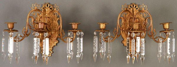 FRENCH AESTHETIC MOVEMENT BRONZE/CRYSTAL SCONCES: A VERY FINE PAIR OF FRENCH AESTHETIC MOVEMENT BRONZE AND CUT CRYSTAL CANDELABRA WALL SCONCES, LATE 19TH CENTURY. Each with three arms with openwork bellflower and scrolled foliate design suspending fo