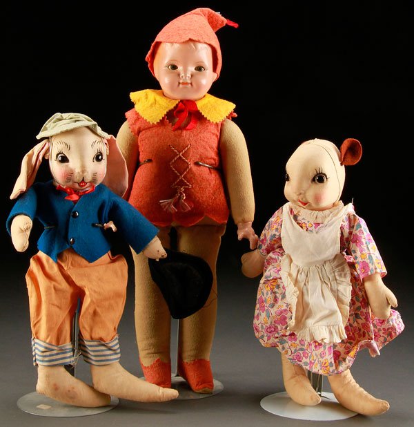 A PETER PAN AND UNCLE WIGGLY DOLL GROUP: A PETER PAN AND UNCLE WIGGLY DOLL GROUP, EARLY 20TH CENTURY. Comprising a very fine Ideal Peter Pan felt doll with hard plastic head and sleep eyes. Together with a pair of Georgene Averill "Uncle Wig