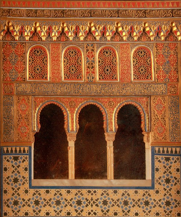 ISLAMIC ALHAMBRA PLAQUE, GRANADA, 19TH C: A PAINTED GESSO ALHAMBRA PLAQUE, GRANADA, 19TH CENTURY. Contained in a glazed gilt frame. 14.75 inches x 13 inches (37.5 x 33 cm).