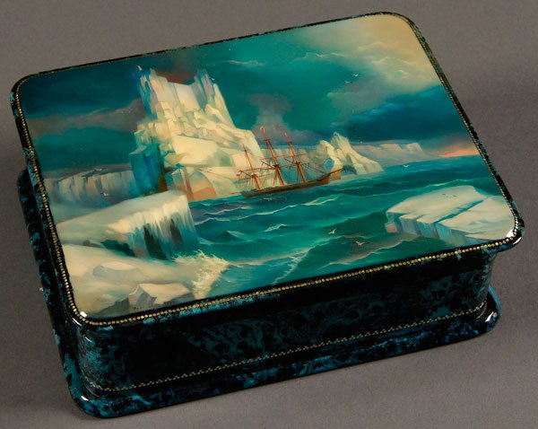 RUSSIAN LACQUER BOX, FEDOSKINO, SIGNED, C. 1999: AN EXCEPTIONAL RUSSIAN LACQUER BOX, FEDOSKINO, SIGNED, CIRCA 1999. The hinged lid finely painted with an image of the famous painting "Ice Mountains" by Aivazovsky, the rim and sides banded in silver 