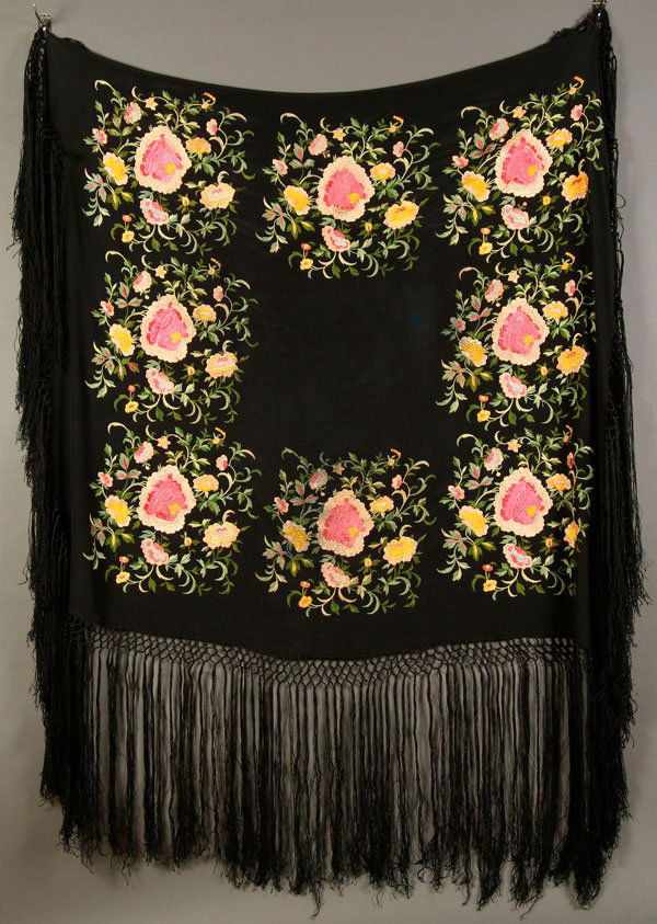 PAIR OF SILK EMBROIDERED PARLOR TABLE COVERS: A VERY FINE PAIR OF SILK EMBROIDERED PARLOR TABLE COVERS, EARLY 20TH CENTURY. One with polychrome embroidered silk florals on a black silk ground, 81 inches square (205.75 cm) with fringe. The other w