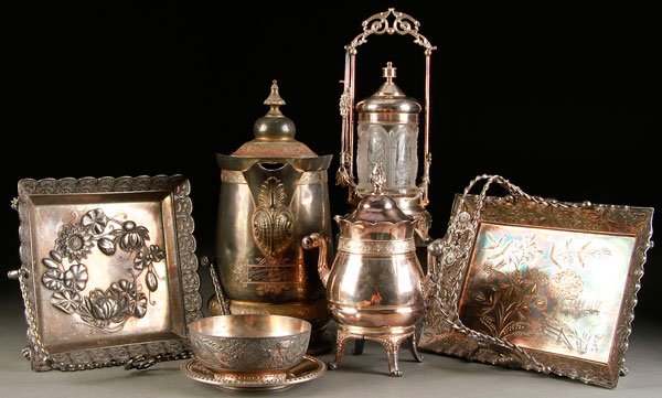 SIX PIECES VICTORIAN SILVER PLATE TABLEWARES: A SIX PIECE VICTORIAN SILVER PLATE TABLEWARES GROUP. Comprising two handled baskets, an ice water pitcher, a pickle castor with pressed glass gothic arch insert, a covered sugar, and a Tufts waste bow