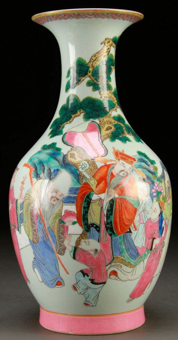 A CHINESE FAMILLE ROSE PORCELAIN VASE: A CHINESE FAMILLE ROSE PORCELAIN VASE, EARLY 20TH CENTURY. Finely decorated with seven immortals, five bats, and a pine tree. With red archaic style seal mark on base. Height 16.25 inches (41.5 cm).