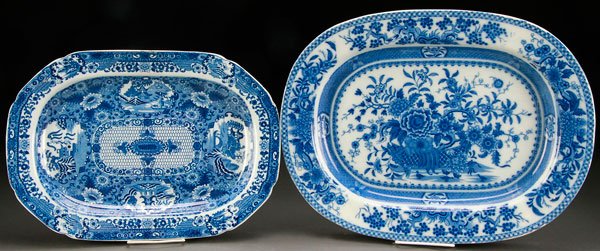 CHINESE EXPORT BLUE WHITE PORCELAIN PLATTERS: A PAIR OF CHINESE EXPORT BLUE AND WHITE PORCELAIN PLATTERS, 19TH CENTURY. With floral decorated centers. Largest length 19 inches (48.25 cm).