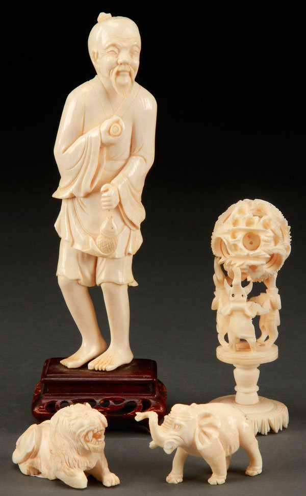 AN ORIENTAL CARVED IVORY GROUP: AN ORIENTAL CARVED IVORY GROUP, EARLY 20TH CENTURY. Comprising a Chinese fisherman (sans pole), a mystery "puzzle" ball with three elephant stand, an elephant figure (tusks damaged), and a figure of a
