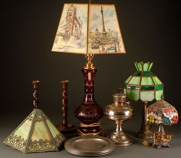 VINTAGE DECORATIVE ARTS AND LIGHTING GROUP, 20TH C.: A VINTAGE DECORATIVE ARTS AND LIGHTING GROUP, 20TH CENTURY. Comprising a Bohemian ruby flashed cut to clear vase/lamp conversion, an early slag panel overlay shade, a nickel plate oil lamp, two barley