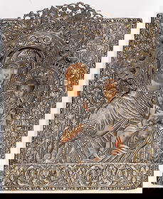 A RUSSIAN ICON OF THE SMOLENSK MOTHER OF GOD: A RUSSIAN ICON OF THE SMOLENSK MOTHER OF GOD, 17TH/18TH C. Comprising a finely painted image of the Smolensk Mother of God, overlaid with a multi-piece silver gilt repousse and chased oklad with ornat