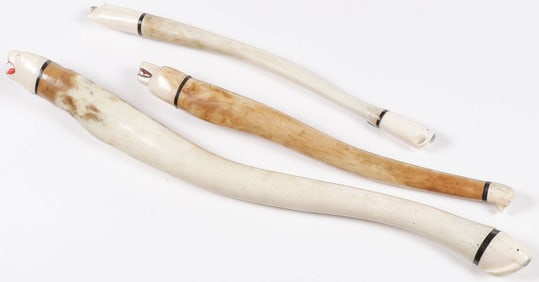 THREE ESKIMO CARVED OOSIK BONE CLUBS