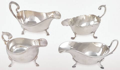 FOUR ENGLISH STERLING SILVER GRAVY BOATS