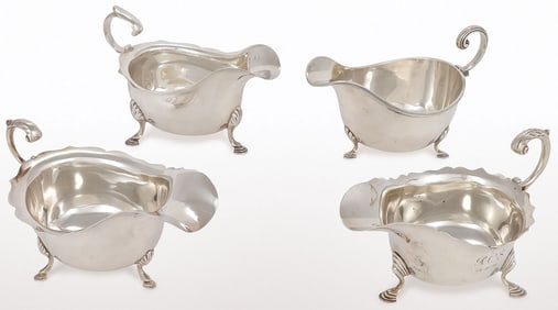 FOUR ENGLISH STERLING SILVER GRAVY BOATS