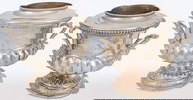 PAIR OF GEORGIAN SILVER-PLATED WINE COOLERS: PAIR OF GEORGIAN SILVER-PLATED WINE COOLERS. Comprising a pair of English silver-plated wine coolers, circa 1815, of urn form, part-fluted with gadrooned edge, with removable liner and collar, the han