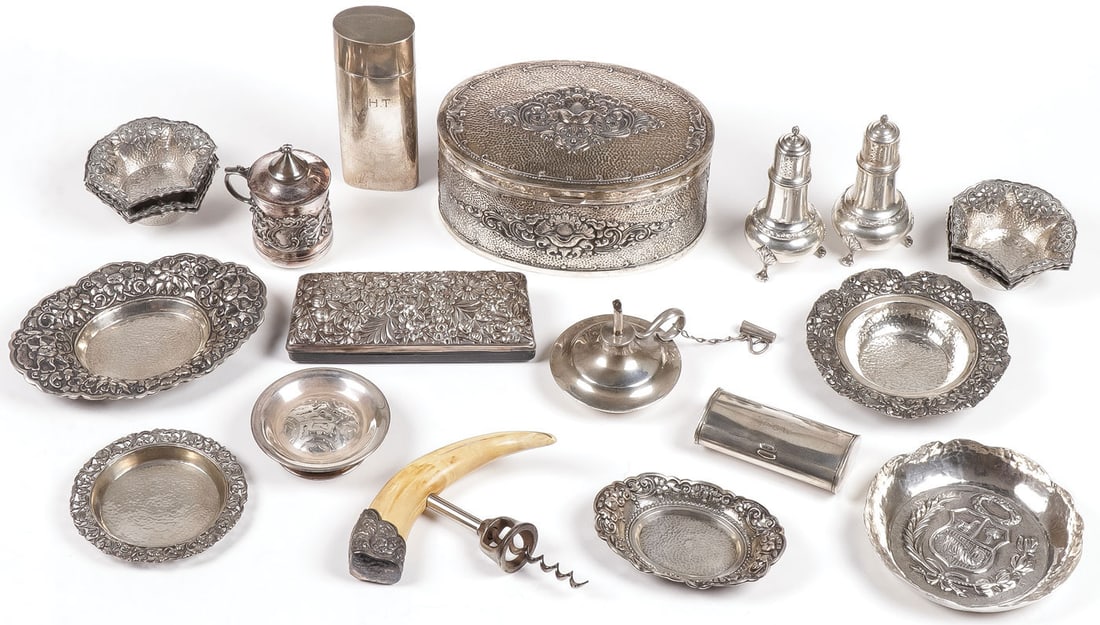 GOOD MIXED SILVER GROUP: GOOD MIXED SILVER GROUP. Comprising 21 individual pieces, most marked .800 or .925 silver, including Asian, American, and Peruvian examples, as shown. Featuring a large oval repoussé, likely Chin