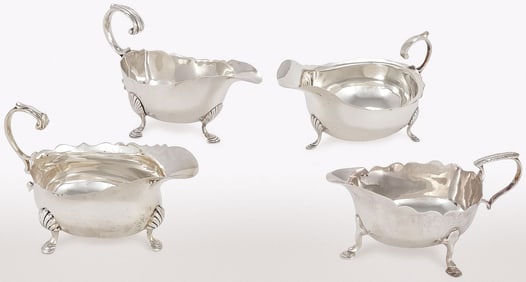 FOUR ENGLISH STERLING SILVER GRAVY BOATS