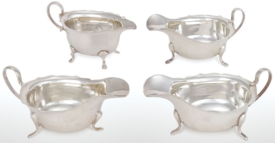 FOUR ENGLISH STERLING SILVER GRAVY BOATS