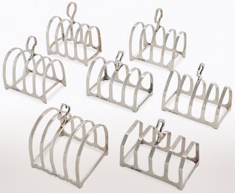 SEVEN ENGLISH STERLING SILVER TOAST RACKS