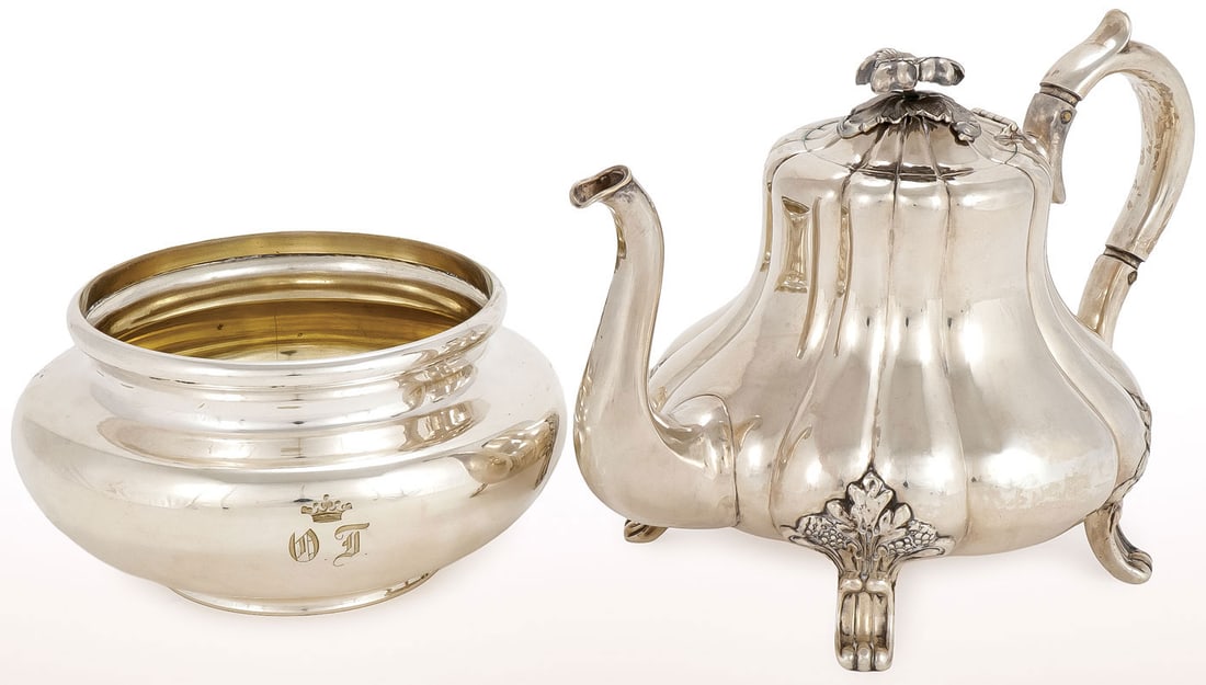 SILVER COFFEE POT AND PLATE BOWL: SILVER COFFEE POT AND PLATE BOWL. Comprising a silver teapot on footed legs with ribbed body, scroll handle, and floral finial on hinged cover. The underside marked THUNE and dated 1858, with indistin
