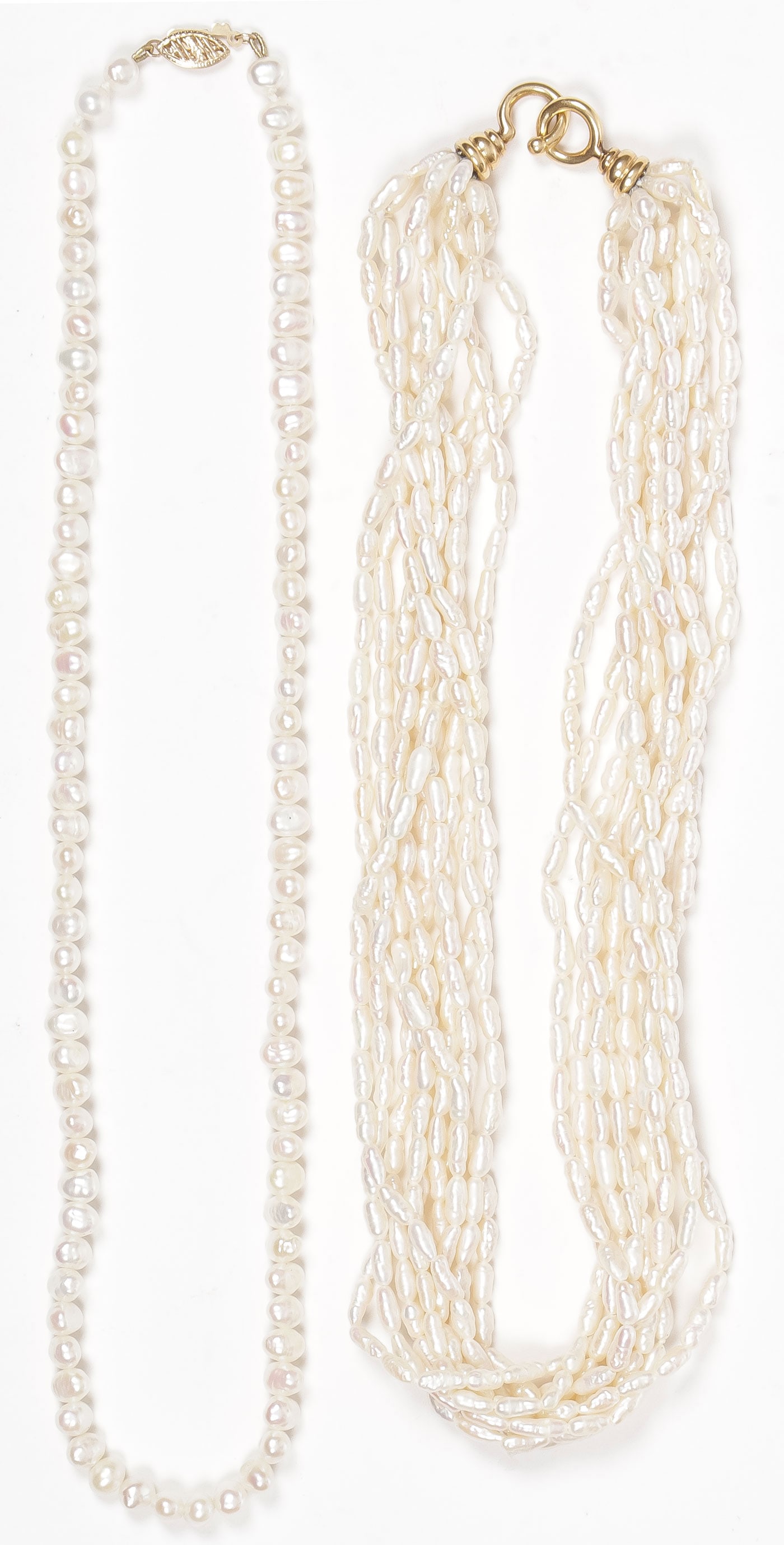 PALOMA PICASSO TIFFANY & CO. PEARL & 18K NECKLACE: PALOMA PICASSO TIFFANY & CO. PEARL & 18K NECKLACE. Comprising a 10-strand freshwater pearl torsade necklace with 18-karat yellow gold clasp, marked PALOMA PICASSO, 1982 T & Co 18K, length 16 inches. T