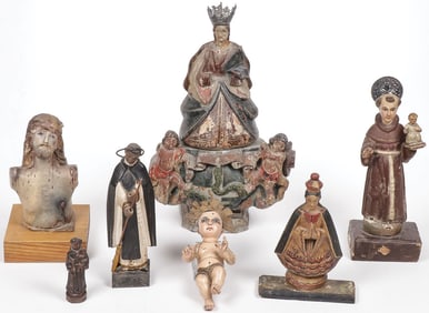 GROUP OF SEVEN CARVED WOOD SANTOS, 19TH C